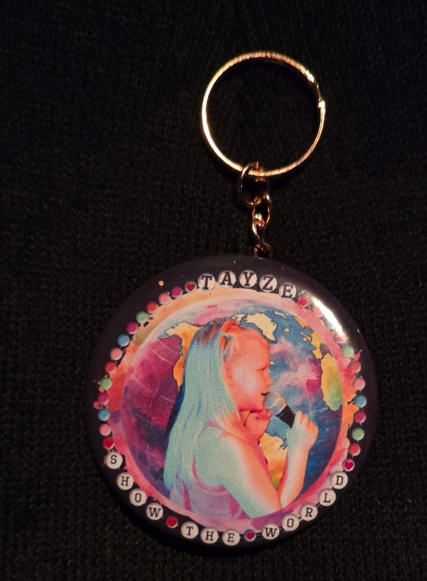 Tayze- Show the World Keychain