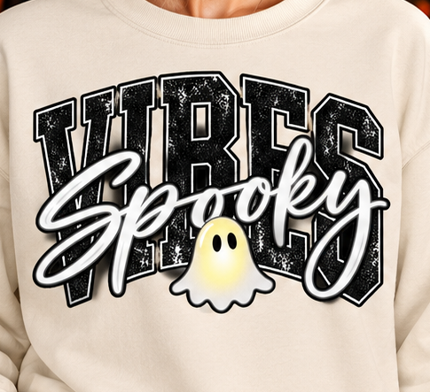 Cream crewneck sweatshirt with distressed black Spooky Vibes lettering and pale yellow ghost on the front, with a plain back